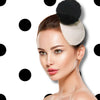 Women wearing white pp straw teardrop fascinator with black tulle pom pom
